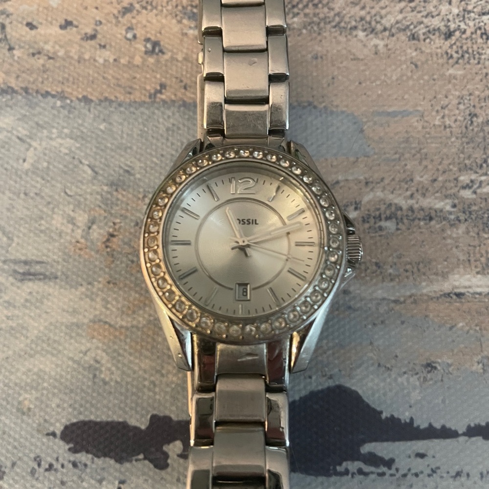 Woman’s fossil wristwatch